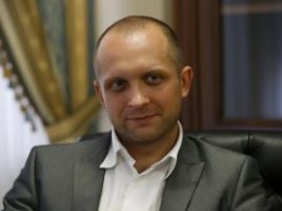 На заседании парламентского комитета показали видео, как нардепу Полякову передавали взятки