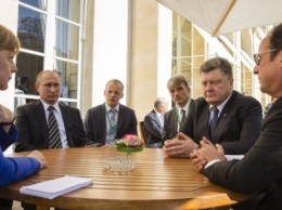 Guardian: Встреча в Париже подняла настроение Москве и Киеву