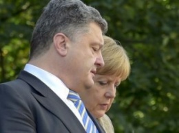 Порошенко и Меркель обсудили по телефону местные выборы в Украине