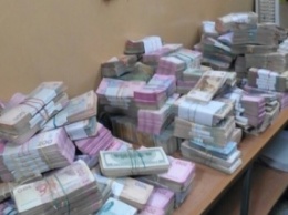 В Киеве суд оставил под арестом рекордную сумму наличных, изъятых в сети обменников