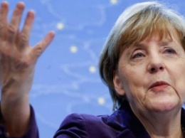 Меркель опередила Путина в рейтинге AFP