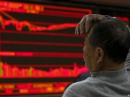 Из-за падения на биржах в Китае остановлена торговля акциями