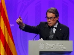 Премьер Каталонии уходит со своего поста ради создания правящей коалиции