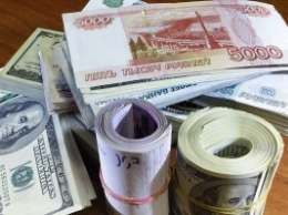 Курс доллара в РФ превысил максимум декабря 2014 года, "пробив" отметку в 81 рубль