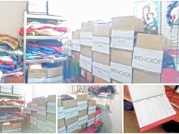 Николаевцы собрали 35 коробок с теплыми вещами для бездомных и сирот