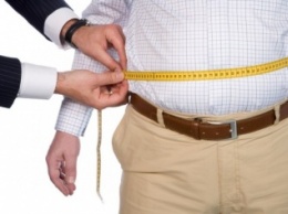 Ученые: Ожирение может оказаться заразным