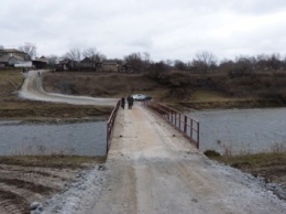 В Павлополе заработал мост через реку Кальмиус, взорванный боевиками в 2014 году