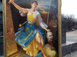 На Майдане в Киеве "Надежда Савченко" отрезала голову "Путину"