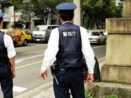 Полиция в Японии провожает учеников до школы из-за разборок якудза