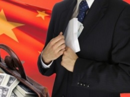 В 2015 году компартия КНР наказала 300 тысяч чиновников за коррупцию