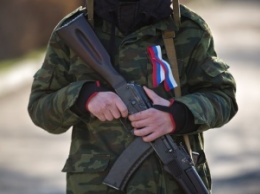На Донбассе найдены захоронения двух военных с шевронами ВС России