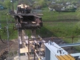 Продолжается ремонт моста между Северодонецком и Лисичанском