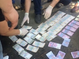 В районе АТО на взятке в 20 тысяч гривен «погорел» полицейский (ФОТО)
