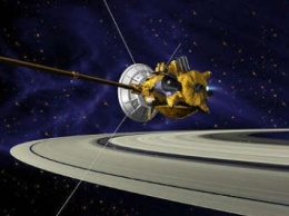 Станция Cassini получила снимок тени Сатурна на кольцах планеты