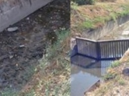 Мариупольцы сегодня увидели две стороны прочистки одной ливневки(ФОТО)
