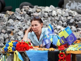 Украина спустя год после сделки с кредиторами не чувствует себя лучше, - Bloomberg