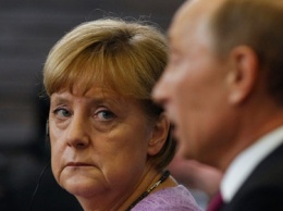 Меркель обсудила с Путиным Украину и Сирию