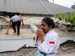 В Индонезии самолета упал на жилые дома, погибли 30 человек