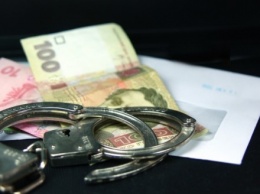 На Кировоградщине главу поселкового совета поймали на взятке в 300 тыс. грн