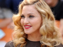 Журнал Billboard присудил Мадонне звание "Женщина года"