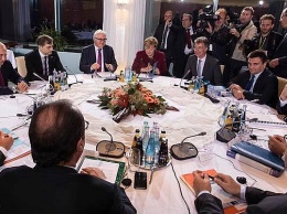 Переговоры в Берлине: Порошенко - бледный и опухший, Путин и Лавров улыбаются