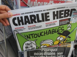 Charlie Hebdo нарисовал карикатуру на собор РПЦ в Париже