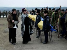 На Днепропетровщине похоронили 12 неизвестных военных из зоны АТО