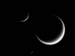 Зонд «Кассини» сфотографировал темные стороны Титана и Сатурна