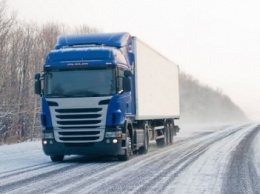 На период снегопадов в Кременчуг запрещено въезжать транзитным грузовикам