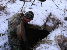 В Луганске обнаружили тайник с оружием и боеприпасами (фото)