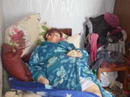Ужасающие фото жертв украинского артобстрела - женщину убило снарядом, когда она вязала носки мужу