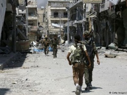 Москва и Дамаск отправили колонну с бронетехникой на помощь курдам