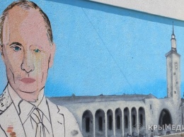 ФОТОФАКТ: В центре Симферополя появилось граффити с Путиным