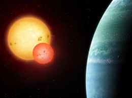 Редкую планету, находящуюся в благоприятной зоне двойной звездной системы обнаружили астрономы