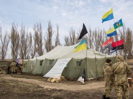 Как ситуация на Донбассе повлияет на курс гривны
