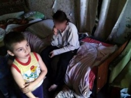 Получивших ожоги мать и ребенка полицейские доставили в Мариуполь (ФОТО)