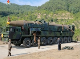 КНДР показала фото испытаний баллистической ракеты "Хвасон-14"
