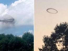 Эти мистические черные кольца в облаках наблюдают по всему миру! Что происходит?!