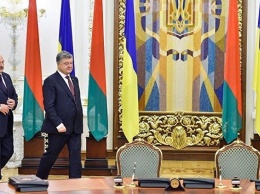 Визит Лукашенко в Киев: амбициозные планы и полуголая девушка