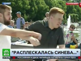 Человек в футболке «Оплота» ударил корреспондента НТВ во время включения с празднования дня ВДВ