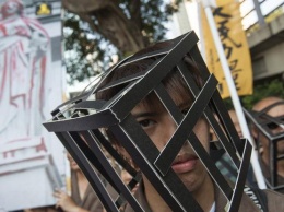 В Гонконге тысячи людей протестуют против ареста революционеров