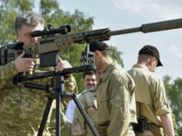 СМИ: Порошенко сам покупает оружие и передает его армии (фото)