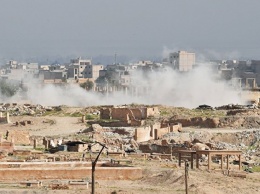 Сирийские войска прорвали позиции ИГ* на главном южном въезде в Дейр-эз-Зор