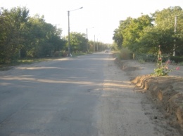 В частном секторе дорогу расширили на метр (фото)