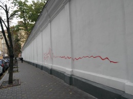 Вандалы испортили граффити отреставрированную стену Софии Киевской