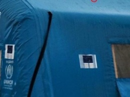 Боевики «ДНР» обстреляли КПВВ «Майорск»: пули попали в палатку для обогрева гражданнских (ФОТО)