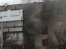 На Харьковщине из горящей "пятиэтажки" эвакуировали пять человек (ФОТО)