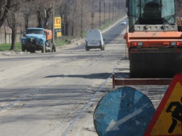 Как выглядит дорога на улице Калибровой после ремонта: полкилометра нового асфальта, но качество оставляет желать лучшего, - ФОТОРЕПОРТАЖ