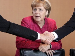 Меркель рассекретила, о чем говорила с Путиным перед встречей с Порошенко