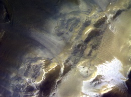 Зонд TGO передал на Землю первые снимки Марса, сделанные с орбиты Красной планеты. Фото